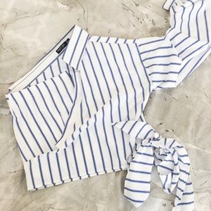 Nastygal single-sleeved blouse.